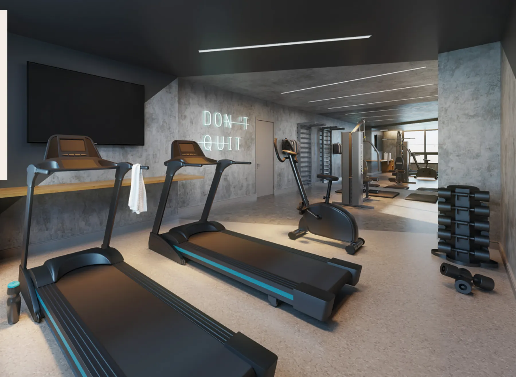 Espaço fitness com esteiras, bicicleta e estação de musculação